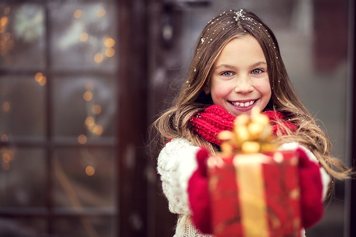 girl holding gift